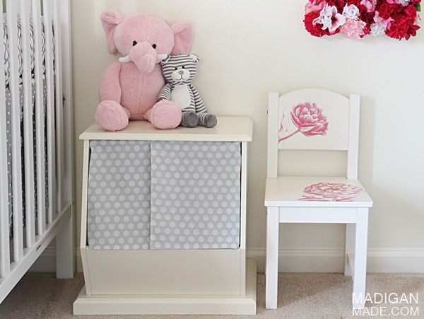 Baby girl nursery decor with toy storage and DIY chair update