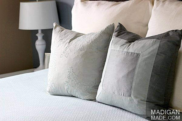 Simple and Elegant Master Bedroom Decor: love these blue silk pillows!