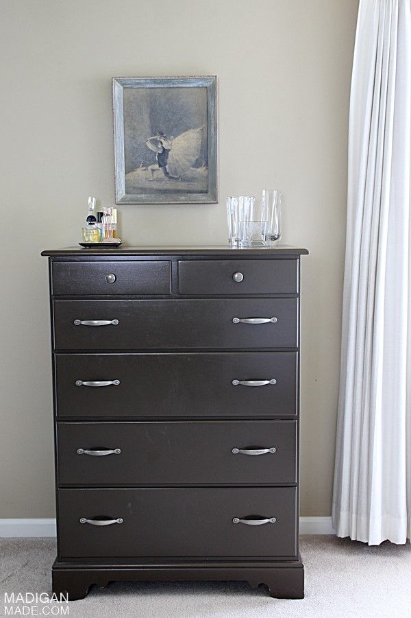 Simple and Elegant Master Bedroom: brown painted dresser and a pretty ballerina print above