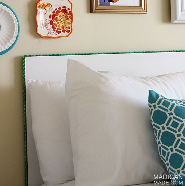 bright and colorful guest room decor with a simple DIY headboard