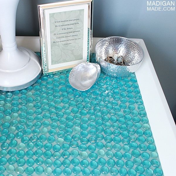 Love this idea! tile a table top with glass gems and resin. 