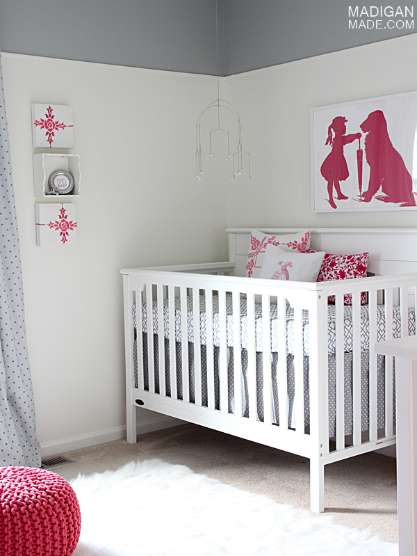 pink and gray baby's nursery decor