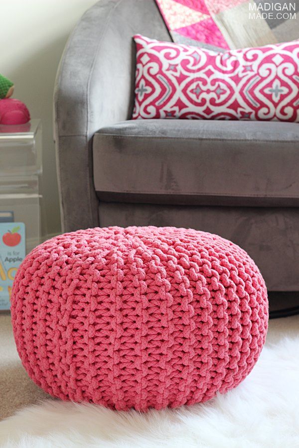 pink knitted pouf for the nursery