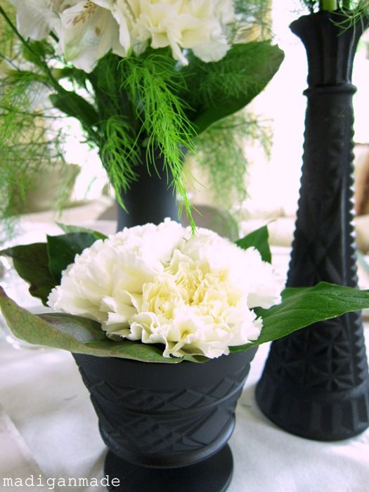 I helped create these black and white floral centerpieces for the tables