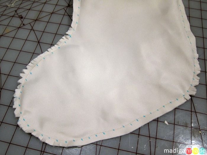 I also clipped several notches around the curves to help the fabric lay 