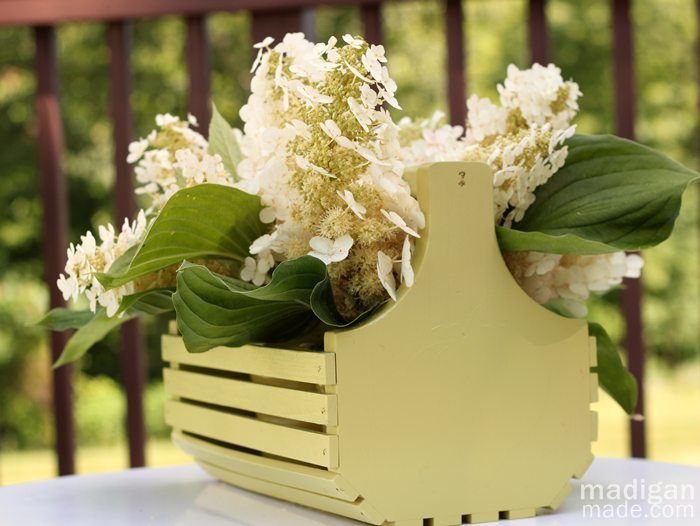 white simple hydrangea bouquet in basket