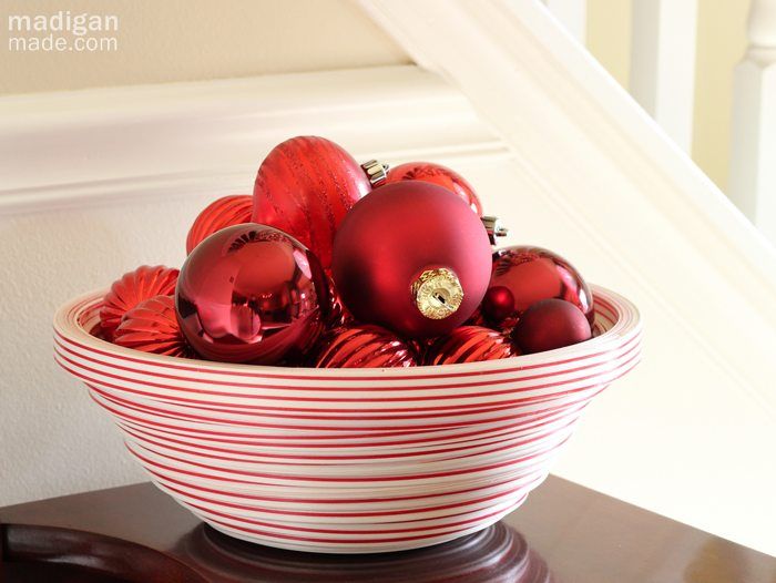 container of red ornaments - part of the holiday home tour at madiganmade.com