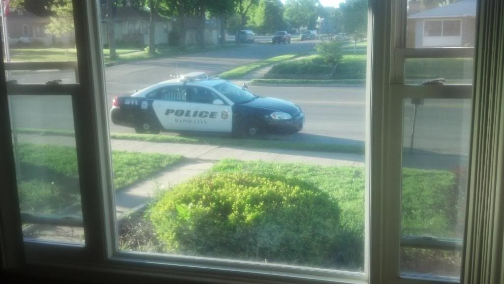 Cop parked outside my house....remember to be courteous